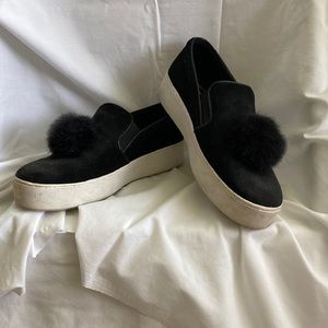 Michael Kors slip on black platform sneakers with pompoms
